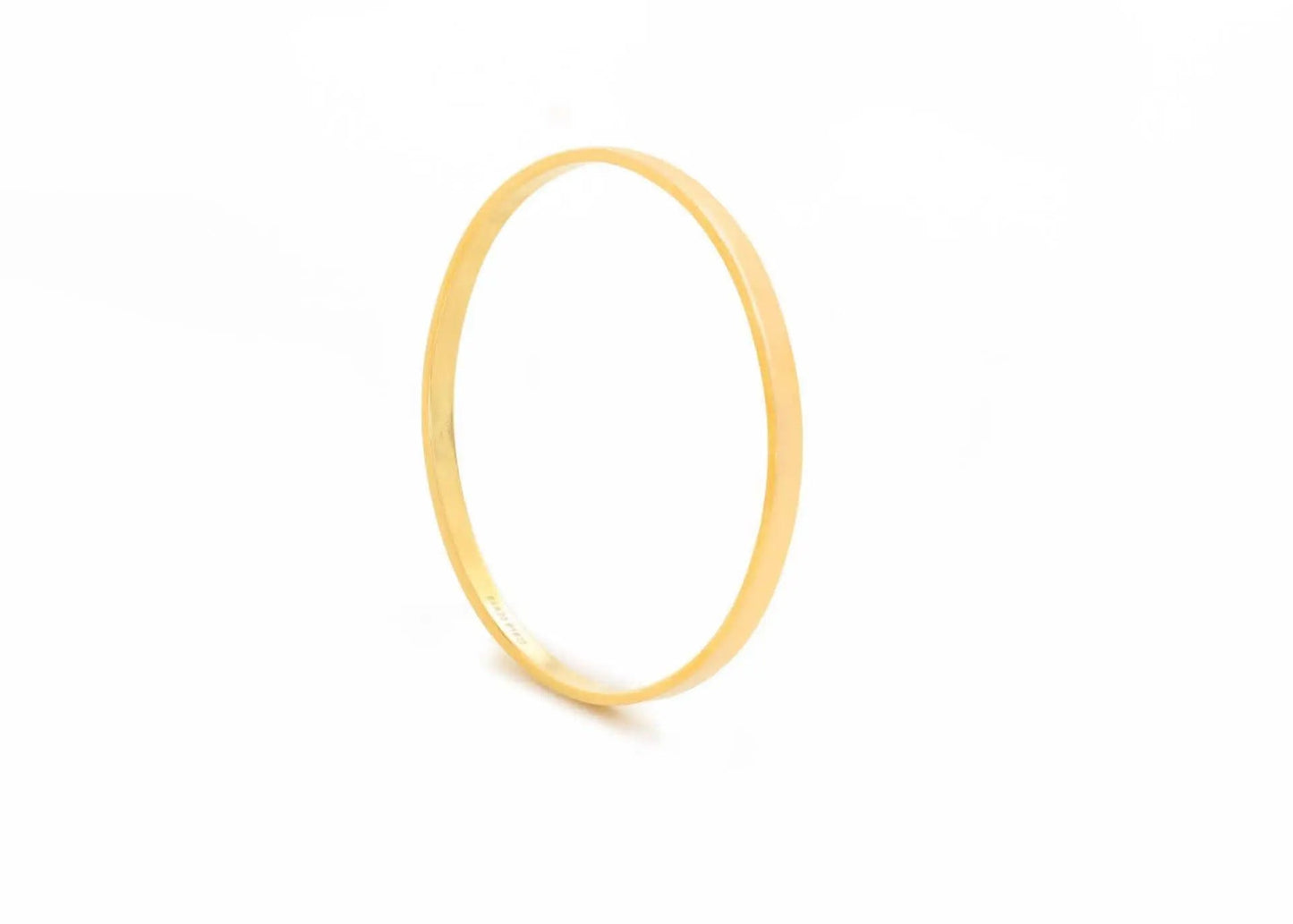 22K gold bangle eclisse classic collection with polished round band design, timeless luxury jewelry Chrysus Golds
